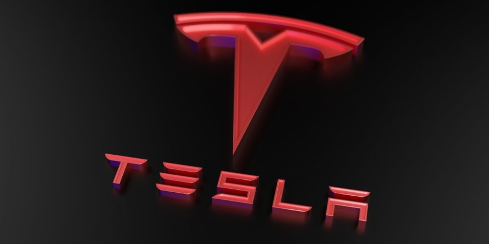 Tesla's $170 Million Loss on Bitcoin Logo